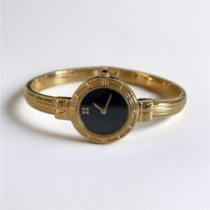 Vintage Yves Saint Laurent Gold Tone Bangle Watch
